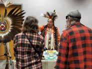 Dietz with cultural regalia and objects